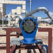 Outdoor industrial dust collection system featuring an installed explosion vent on the vessel for pressure relief. Outdoor industrial dust collection system featuring an installed explosion vent on the vessel for pressure relief.